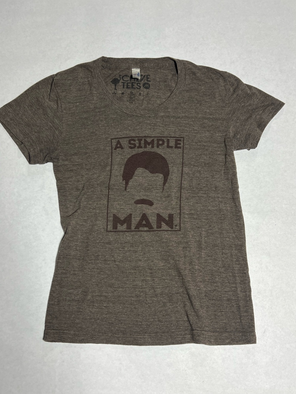 Women’s Chive Simple Man shirt size Medium.